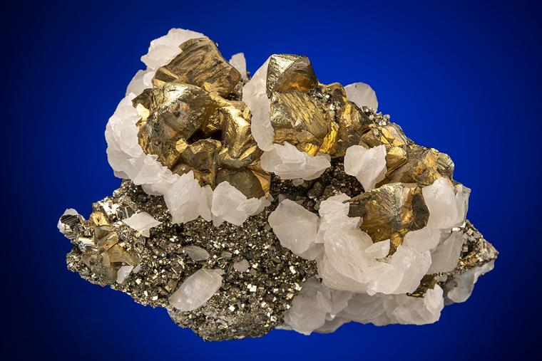 CHALCOPYRITE with CALCITE on PYRITE